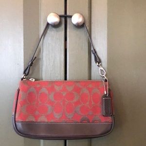Coach Bag
Red and Brown Fabric Clutch